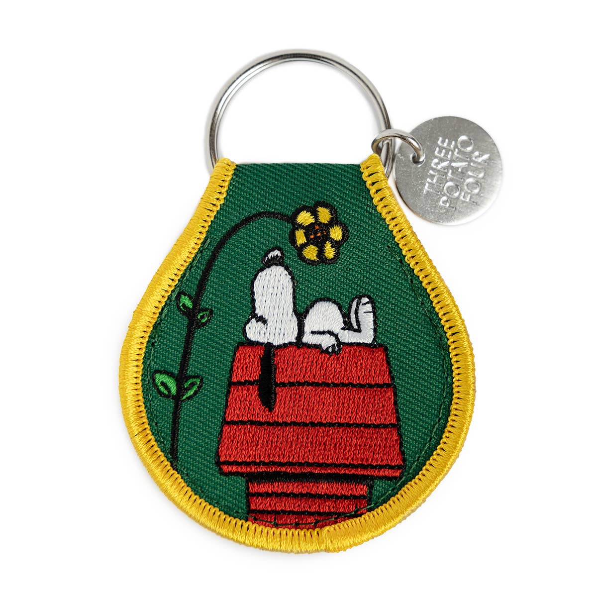 A Snoopy Doghouse Flower Patch Keychain made by Three Potato Four.