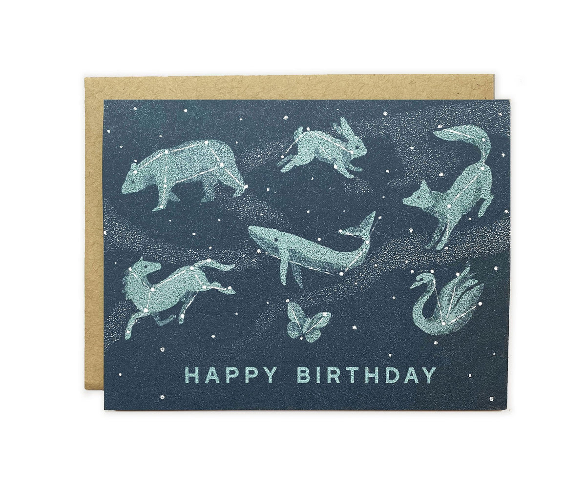 A Happy Birthday Constellation Greeting Card with a starry sky and animals on it by The Wild Wander.