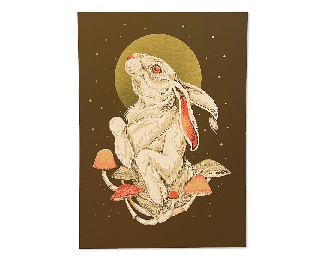 Featuring an enchanting screenprint design, "Fundraiser for Equality VA" by The Wild Wander captures a rabbit amidst mushrooms against a dark backdrop, with a gold foil-like circle shining behind its head.