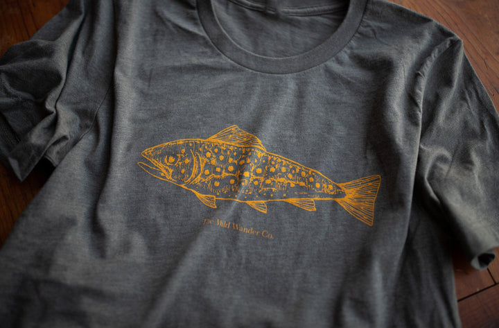 A gray Brook Trout T-Shirt with a brown trout on it from The Wild Wander.