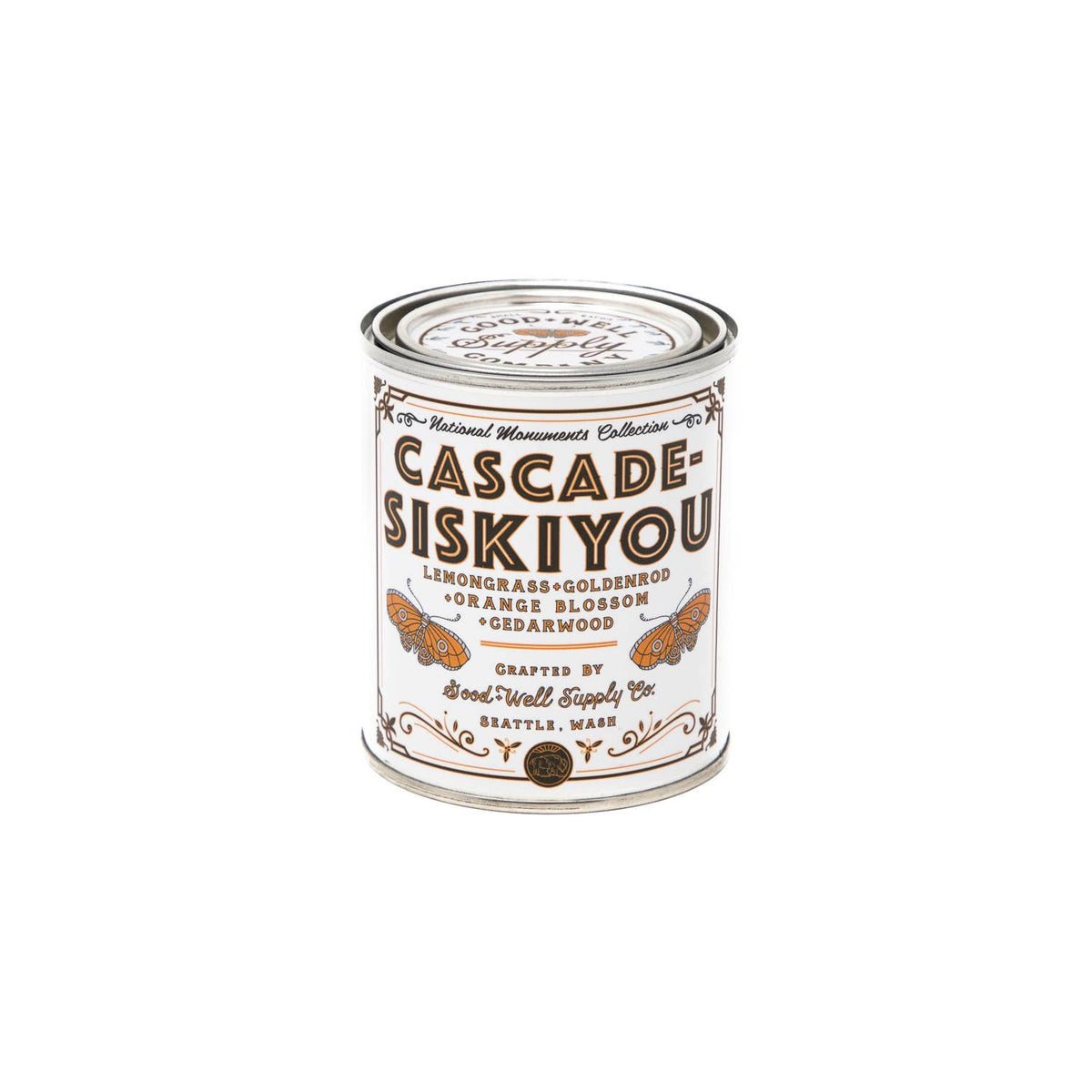 Good &amp; Well Supply Co. Cascade-Siskyou Candle tin with a label on it.