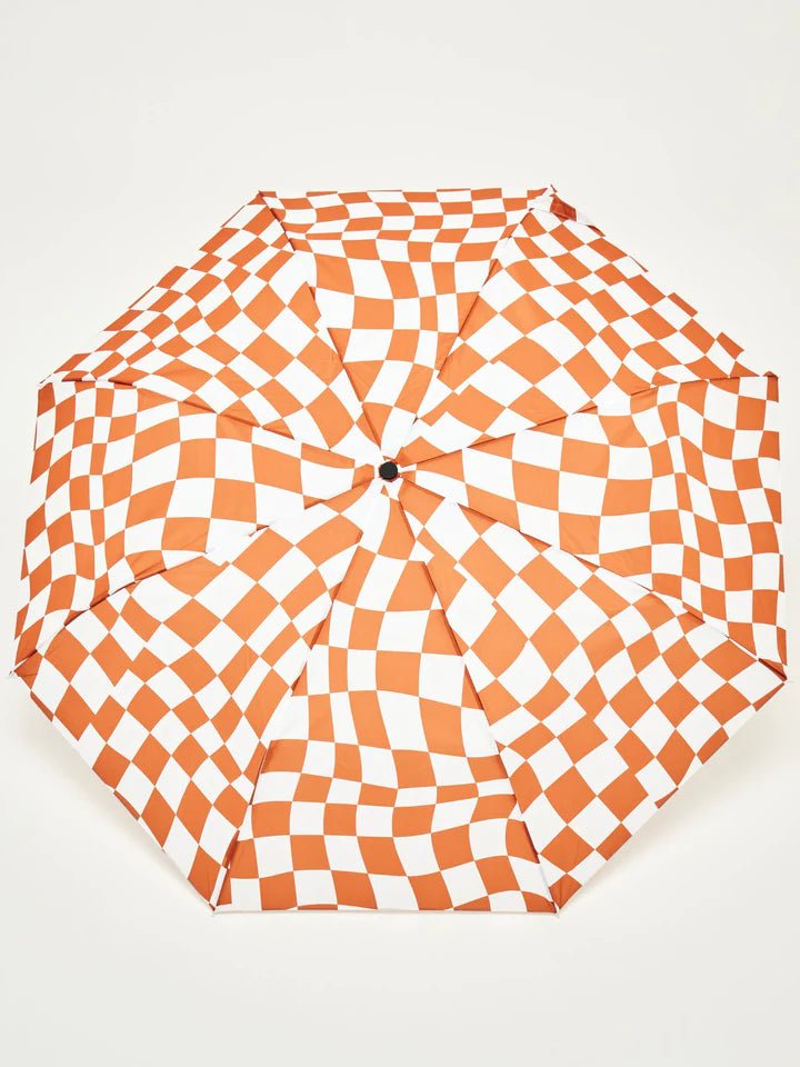 An Original Duckhead Peanut Butter Checkers Umbrella with a brown and white checkered pattern.